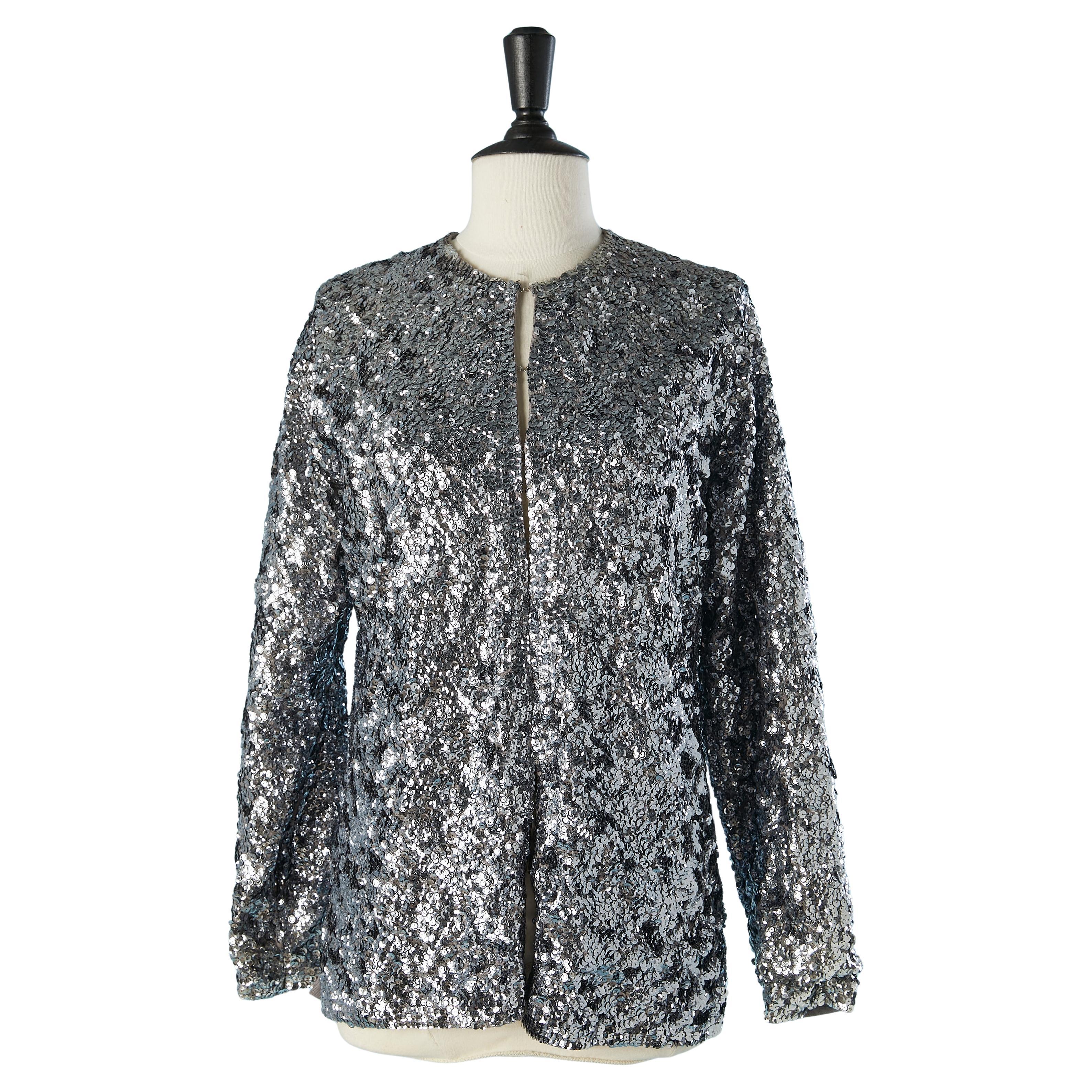 Silver sequin edge to edge evening jacket on a grey knit base Circa 1970's