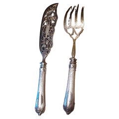 Couteau et fourchette à poisson de service en argent avec rare manche guilloché