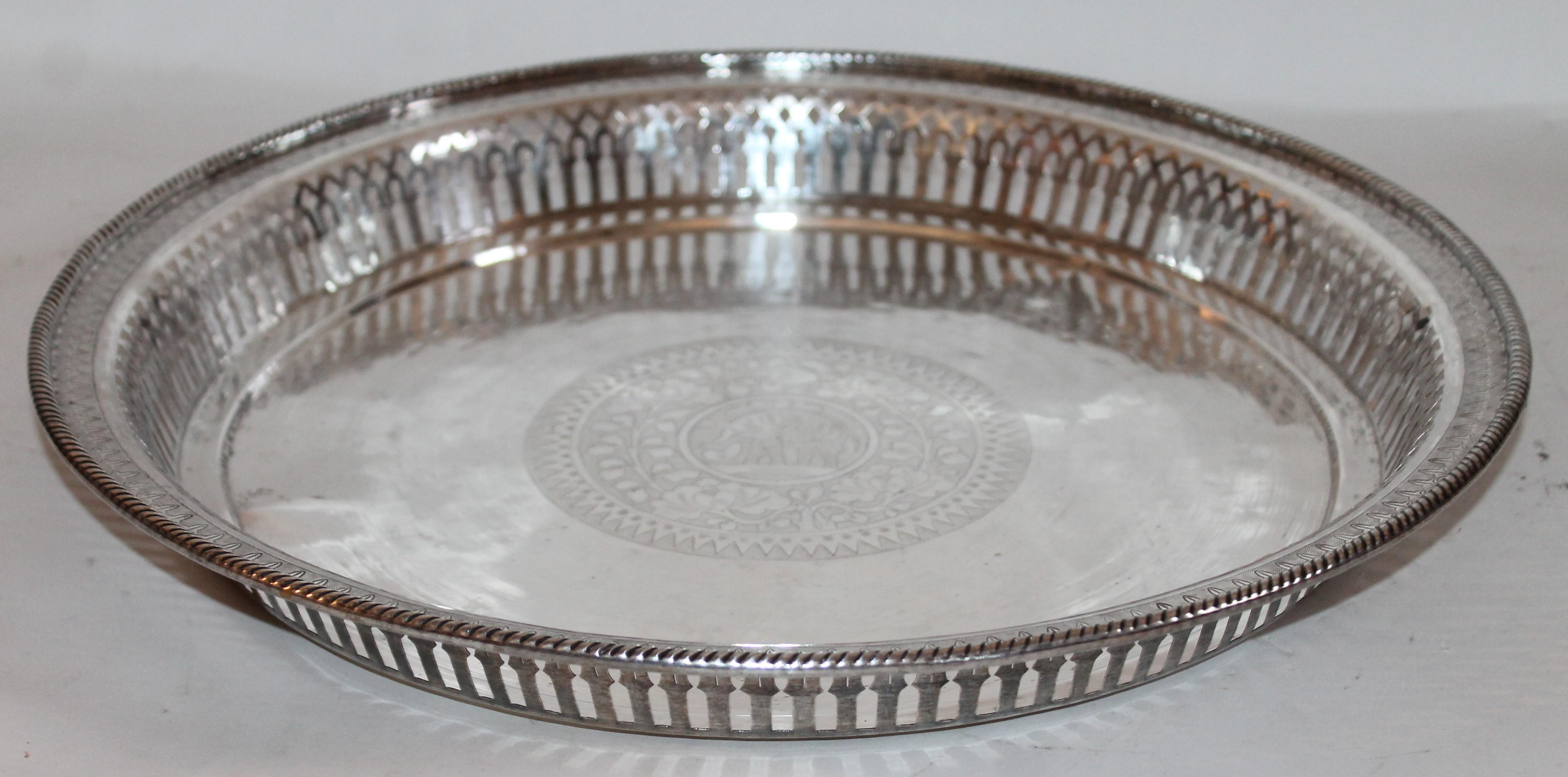 This fantastic 800 silver serving tray is in fine condition and has a embossed elephant in the center of the tray. Polishes up very nicely. Great cocktail tray.