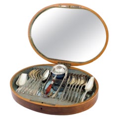 Silver set with strainer, tongs, twelve spoons and two shovels in case