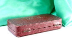 Silver sewing kit with various utensils in an original velvet case