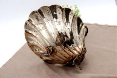 Silver shell-shaped fruit bowl