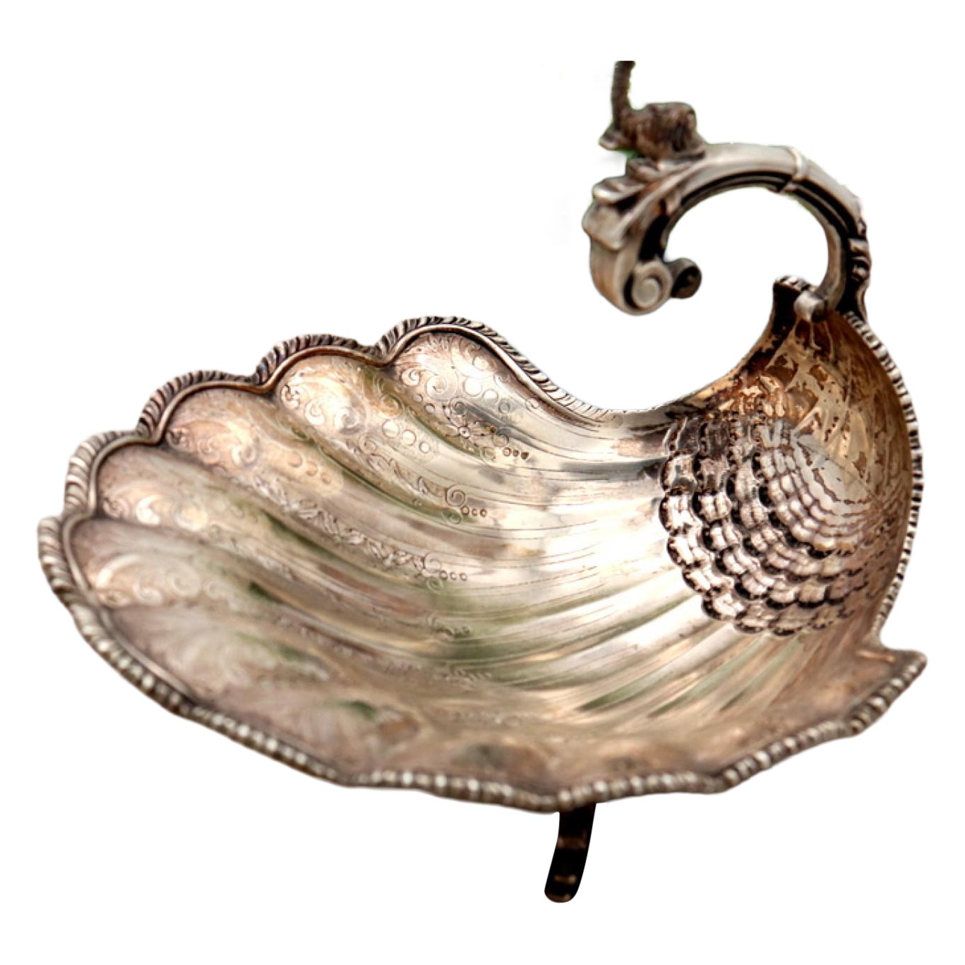 Silver shell-shaped fruit bowl