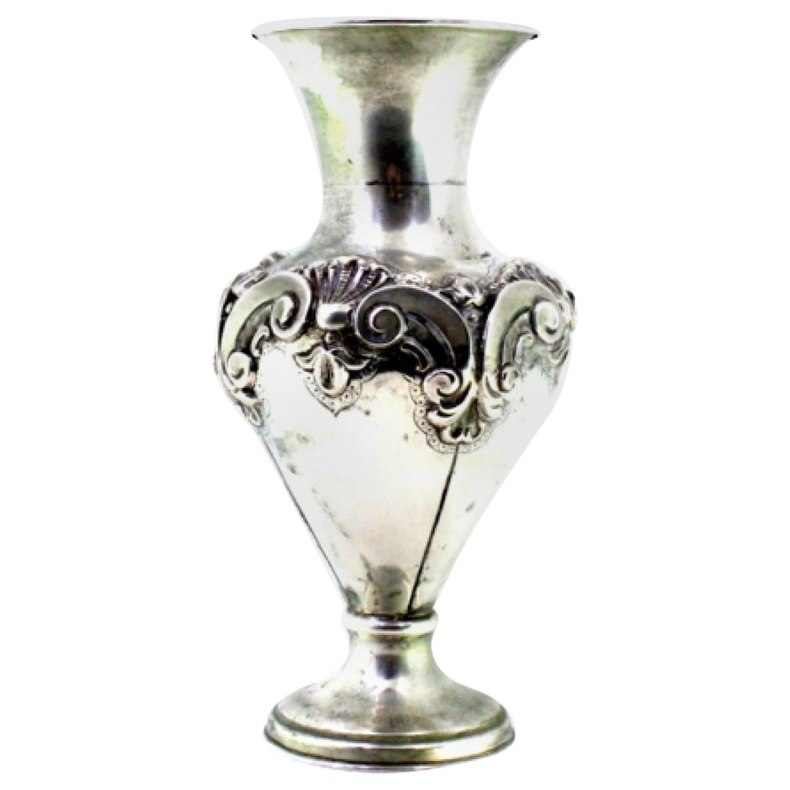 Silver shell-shaped jug with circular base and friezes For Sale
