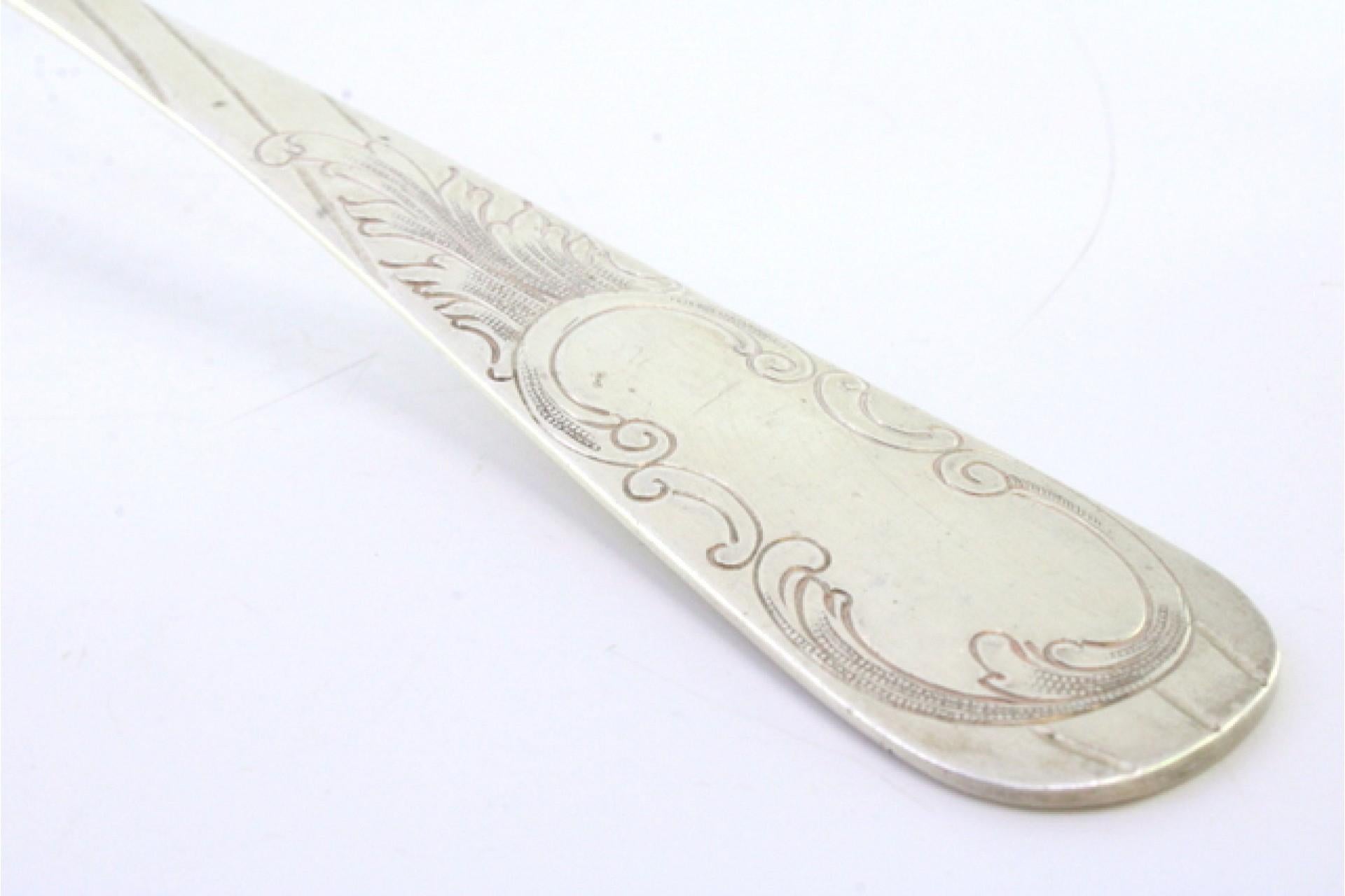 European Silver shell-shaped ladle with engraved monogram cartouche For Sale
