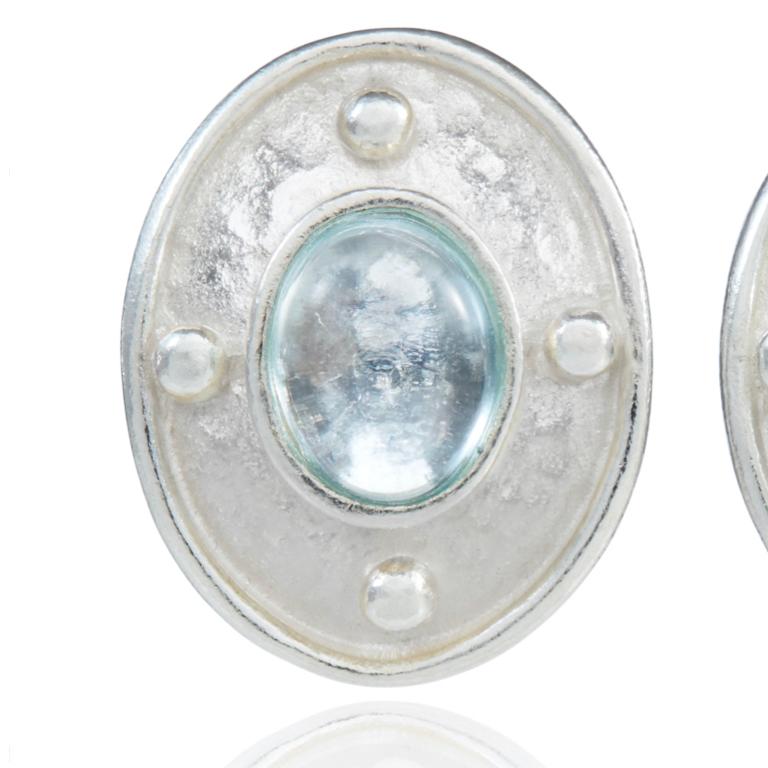 Sterling silver earrings in London blue topaz. With post and butterfly fittings.

Esther Eyre has been designing and making precious jewellery for over twenty years. She trained at Kingston and Middlesex gaining a BA in jewellery design in 1982.