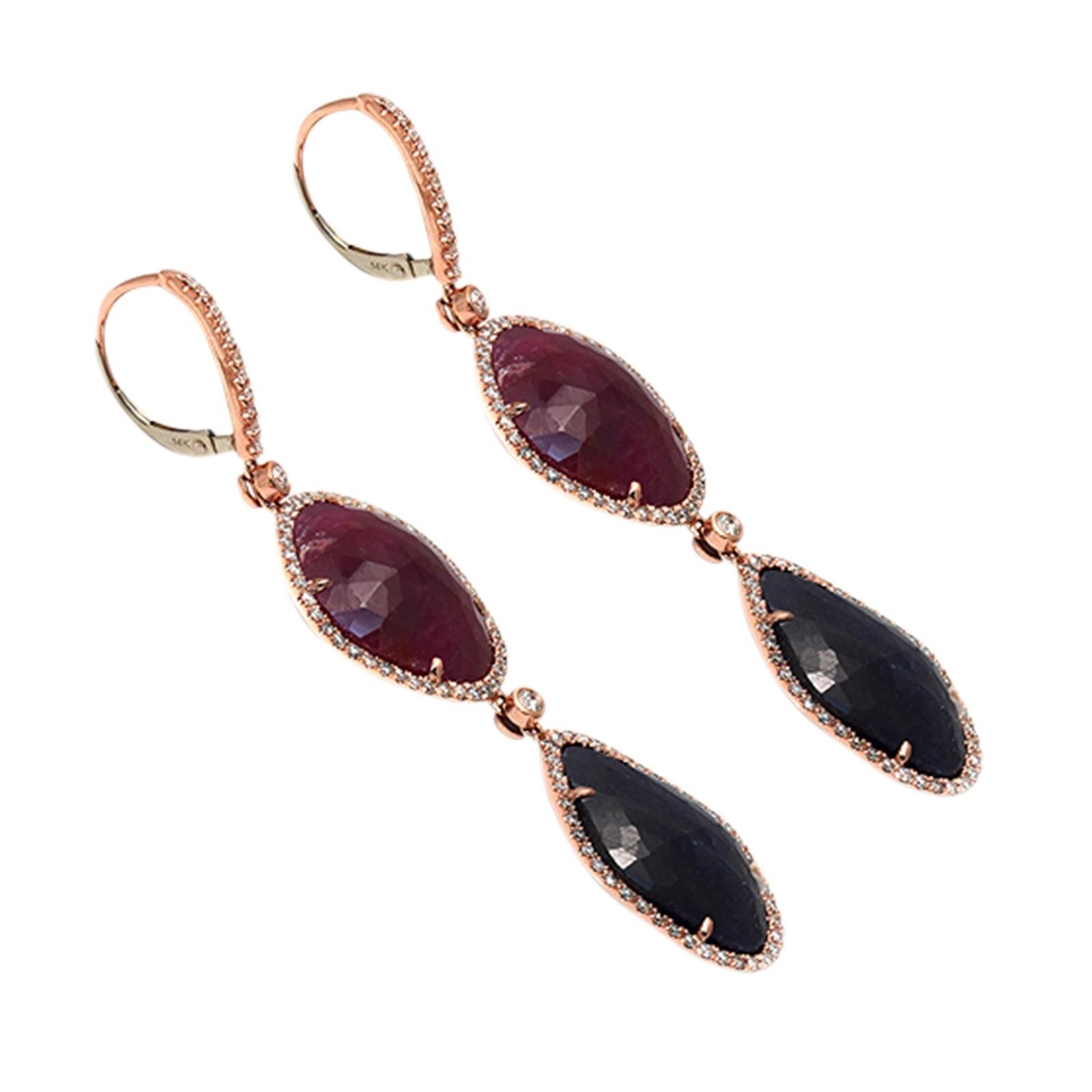 Type: Earrings
Height: 68 mm
Width: 17.5 mm
Metal: Rose Gold
Metal Purity: 14K
Hallmarks: 14K
Total Weight:14.7 Grams
Stone Type: 39 CT Natural Sapphire and Ruby, 1.24 CT G SI1 Diamonds
Condition: New
Stock Number: NP19