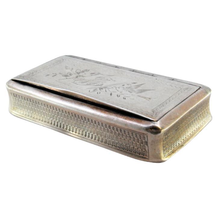 Silver snuff box w/ floral motifs 
engraved birds, surrounding a monogram card For Sale