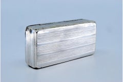 Silver snuff box w/ friezes around the edge, relief country motifs & hinged lid