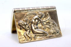 Silver snuff box w/ relief figures, guilloche bands at the top & gilded interior