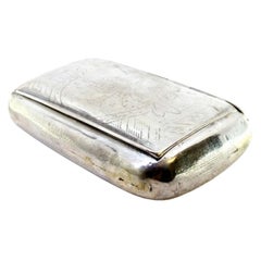 Silver snuff box with engraving and hinged lid