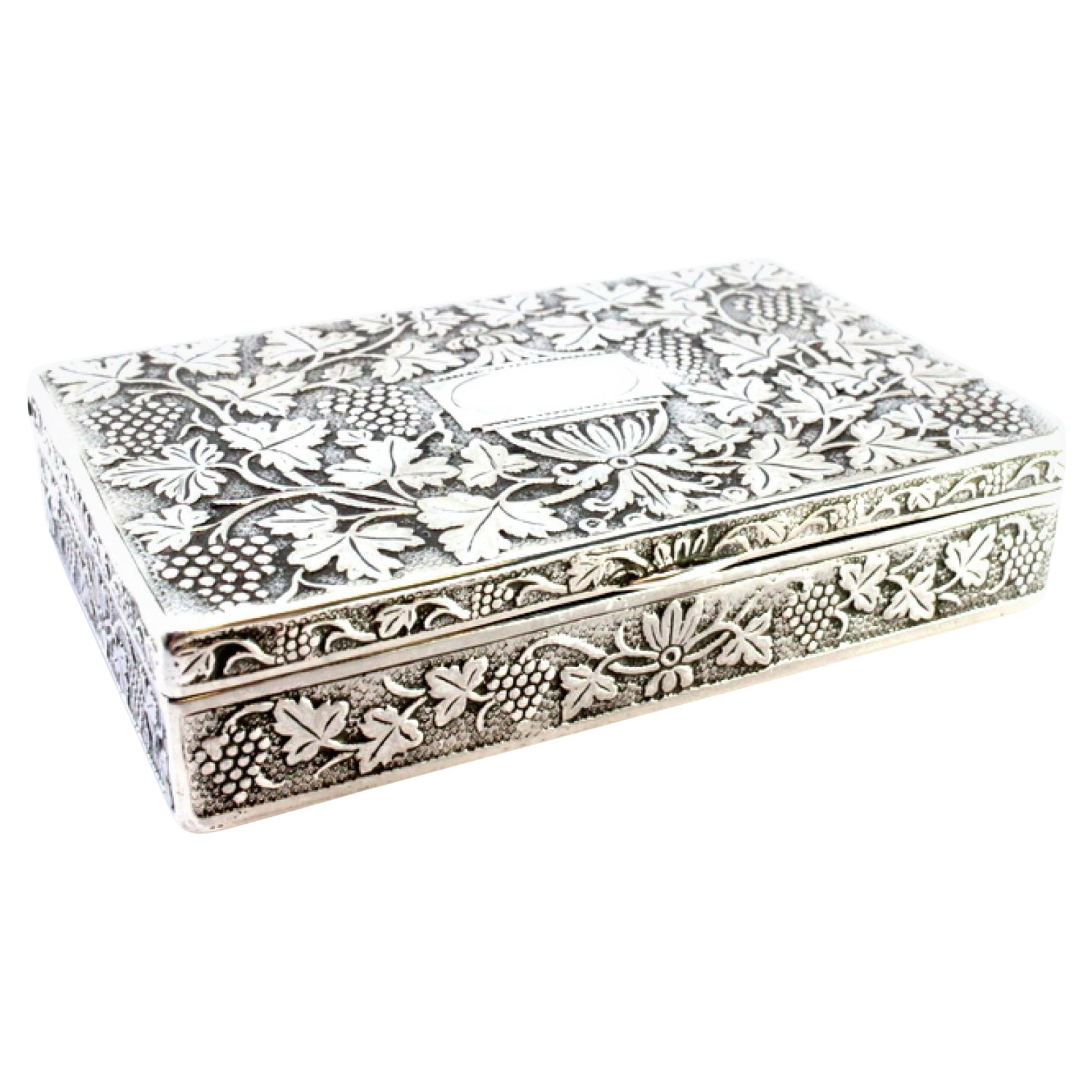 Silver snuff box with floral embossing around monogram card