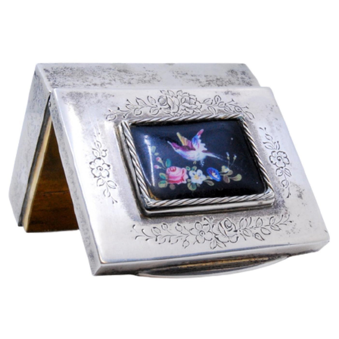 Silver snuff box with floral engravings and enamel hummingbird lid