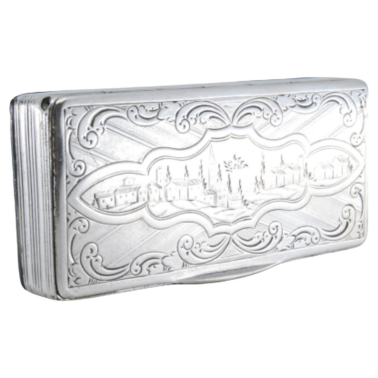 Silver snuff box with friezes and engraved city-scene lid