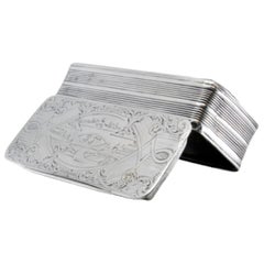Silver snuff box with friezes and engraved country-scene lid