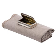 Silver snuff box with gold interior