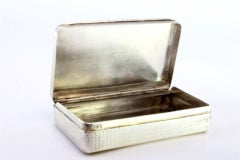 Silver snuff box with guilloche florals around monogram card