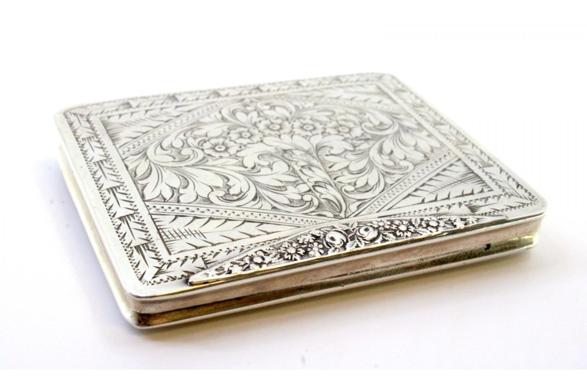 European Silver snuff box with raised floral motifs, monogram card and hinged lid For Sale