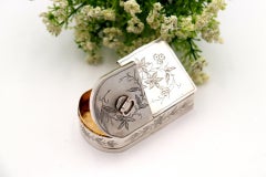 Silver snuffbox and matchbox