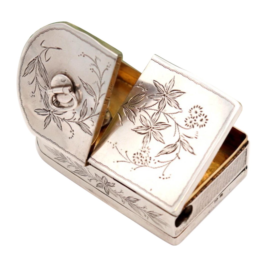 Silver snuffbox and matchbox