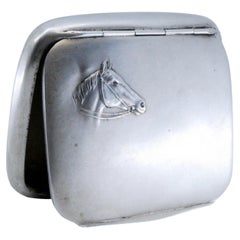 Silver snuffbox in Art Nouveau style with a relief horse figure