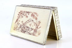 Silver snuffbox with ivory-topped lid, friezes & gold interior