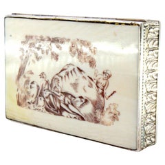 Silver snuffbox with ivory-topped lid, friezes 
gold interior