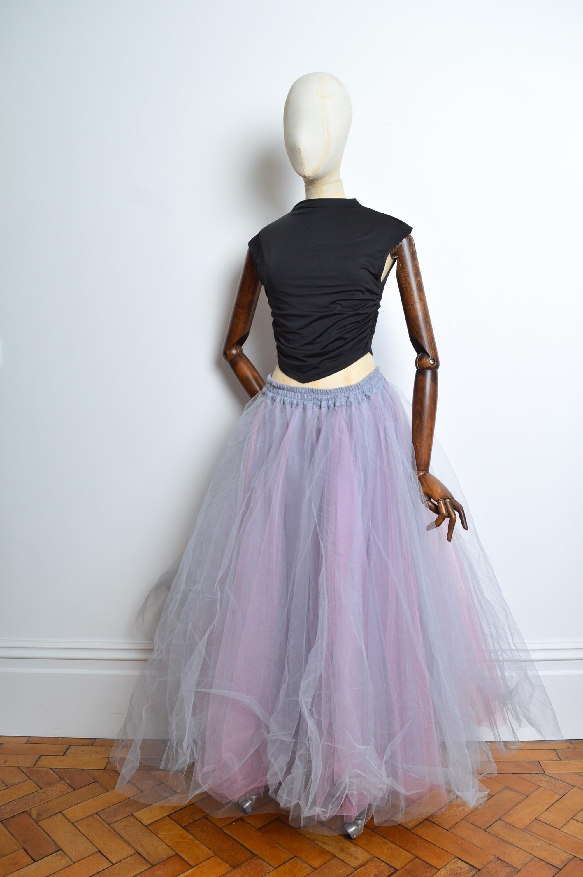 1990’s Jeff Galliano Silver & Rose Pink Huge Tulle Statement Maxi Skirt
Size; One Size
Measurements are provided in inches (‘’)
Waist; 28’’ - 34’’ (Stretchy)
Length; 38’’
Condition; 9/10 (Deadstock)
Material; 100% Polyester 
Country; MADE IN