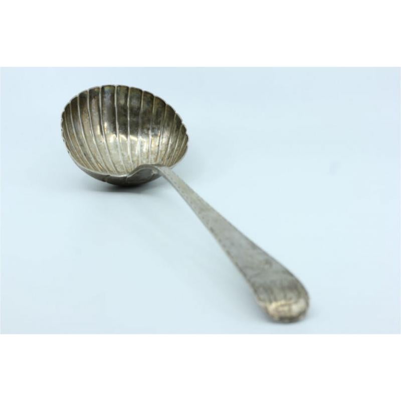 Description: Silver soup ladle in the shape of a shell and handle to be shipped. Metal: Silver. Origin: Portugal. Brand: Lisbon Crown. Weight: 205.12 grams. Dimensions: Content: 833/1000. Assay Mark: Yes, from the 15th century to 1885. Additional