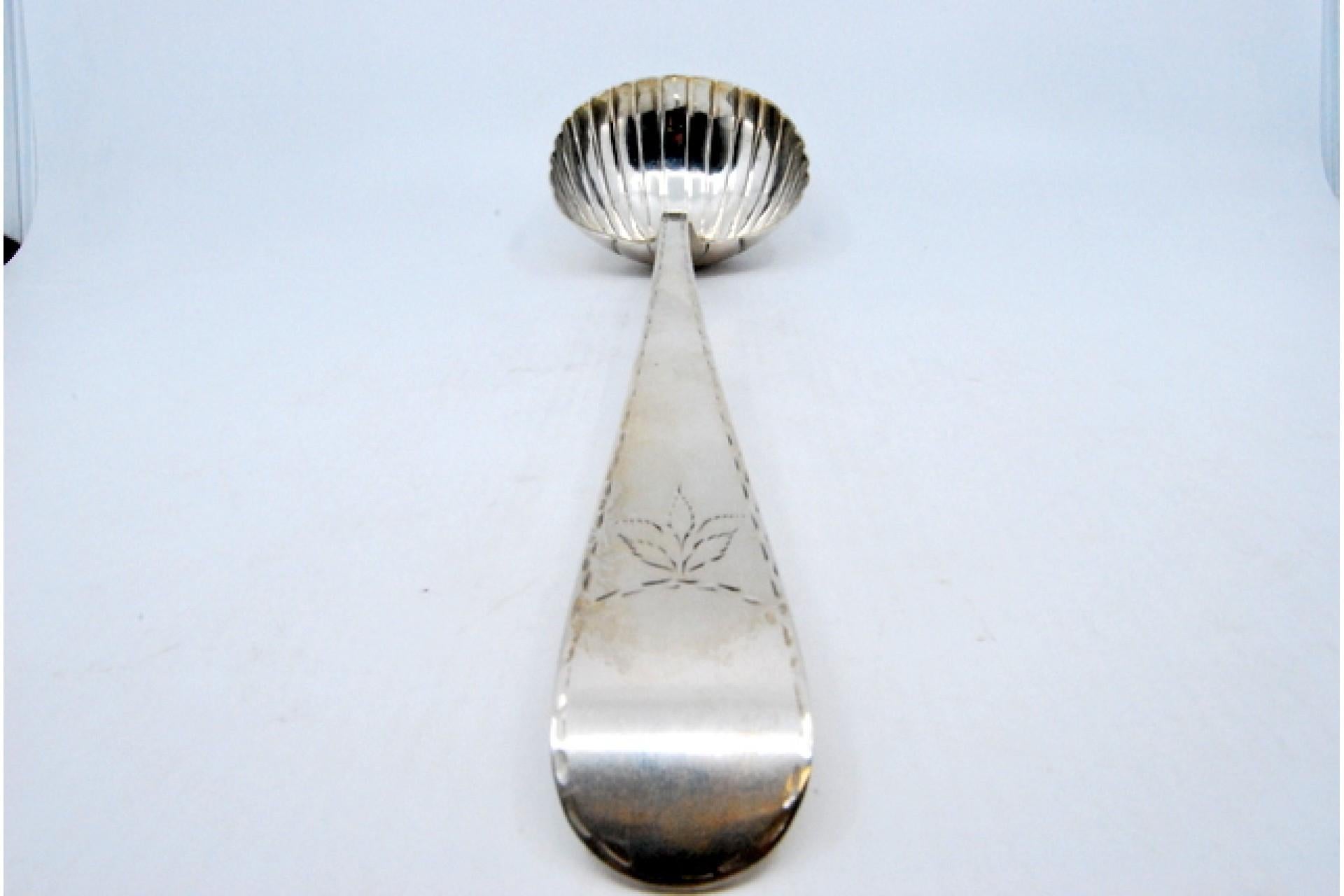 European Silver soup ladle in the shape of a shell with engraving on the handle For Sale