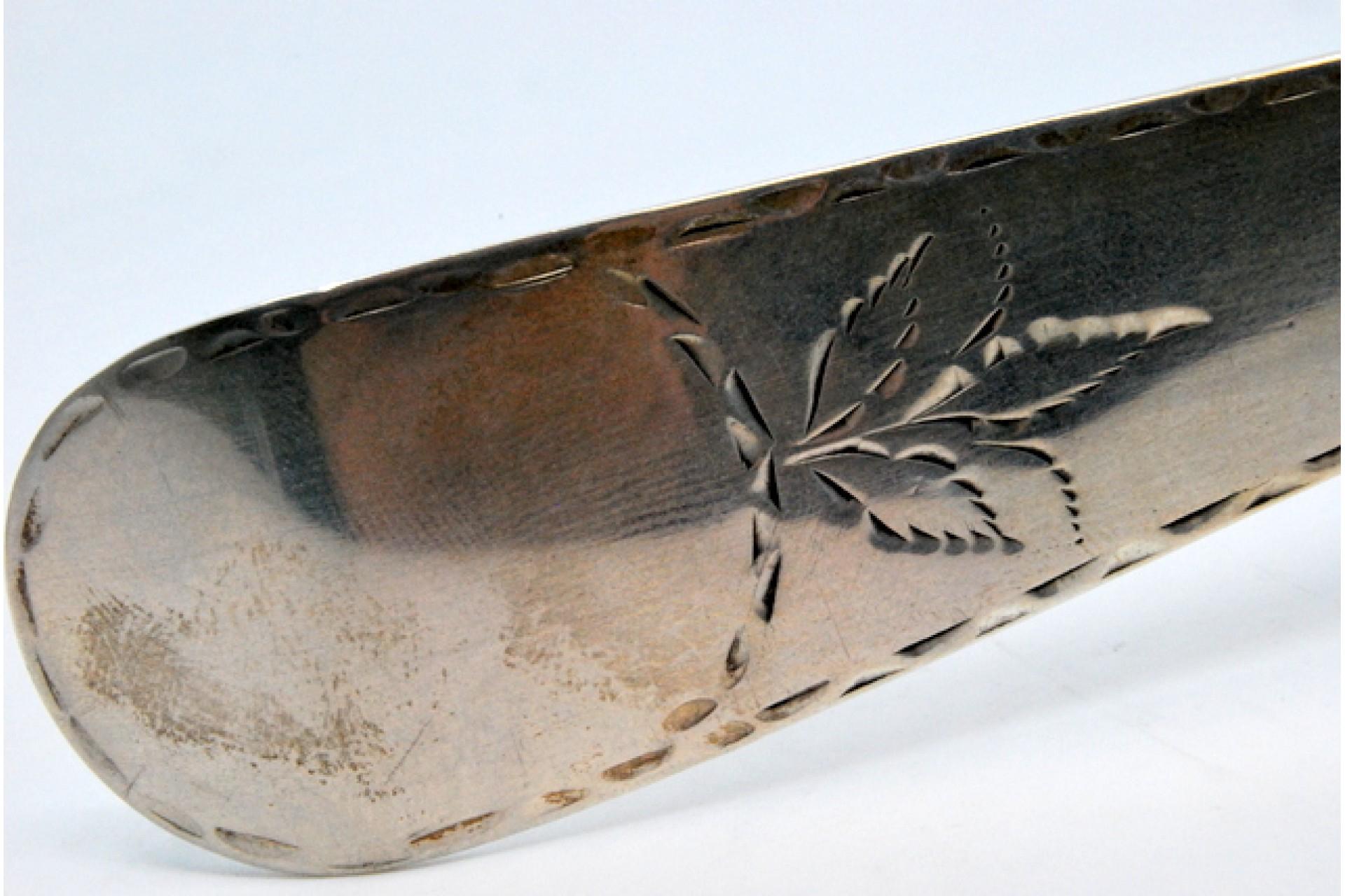 18th Century Silver soup ladle in the shape of a shell with engraving on the handle For Sale