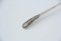 Silver soup ladle with acanthus leaf reliefs