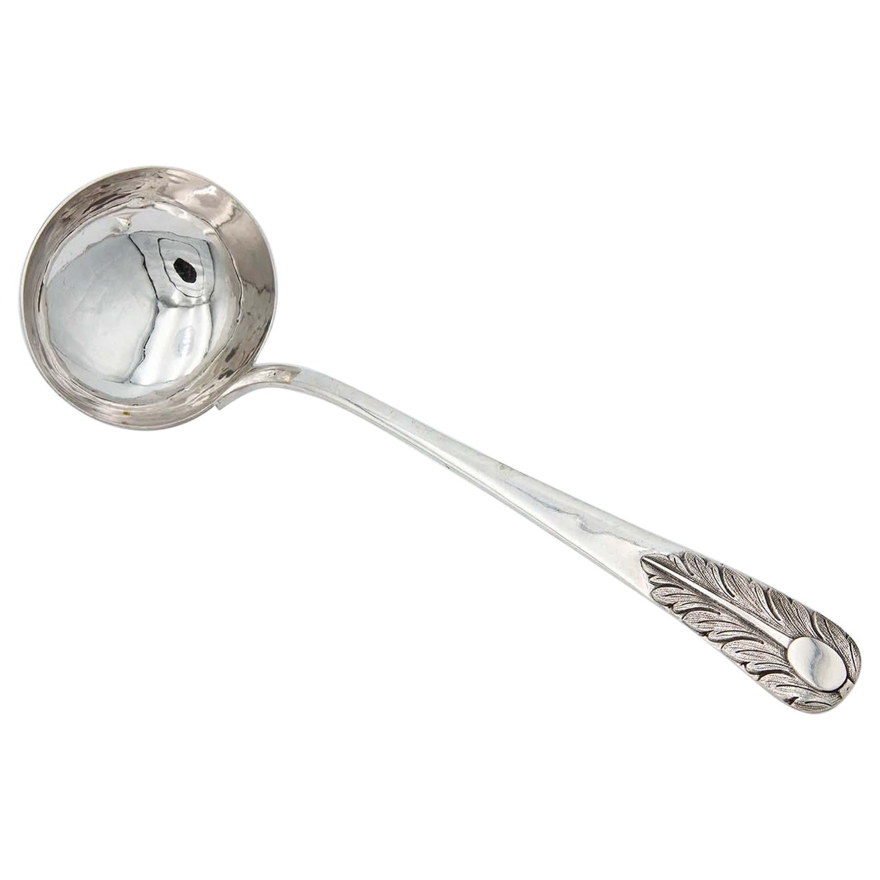 Silver soup ladle with acanthus leaf reliefs