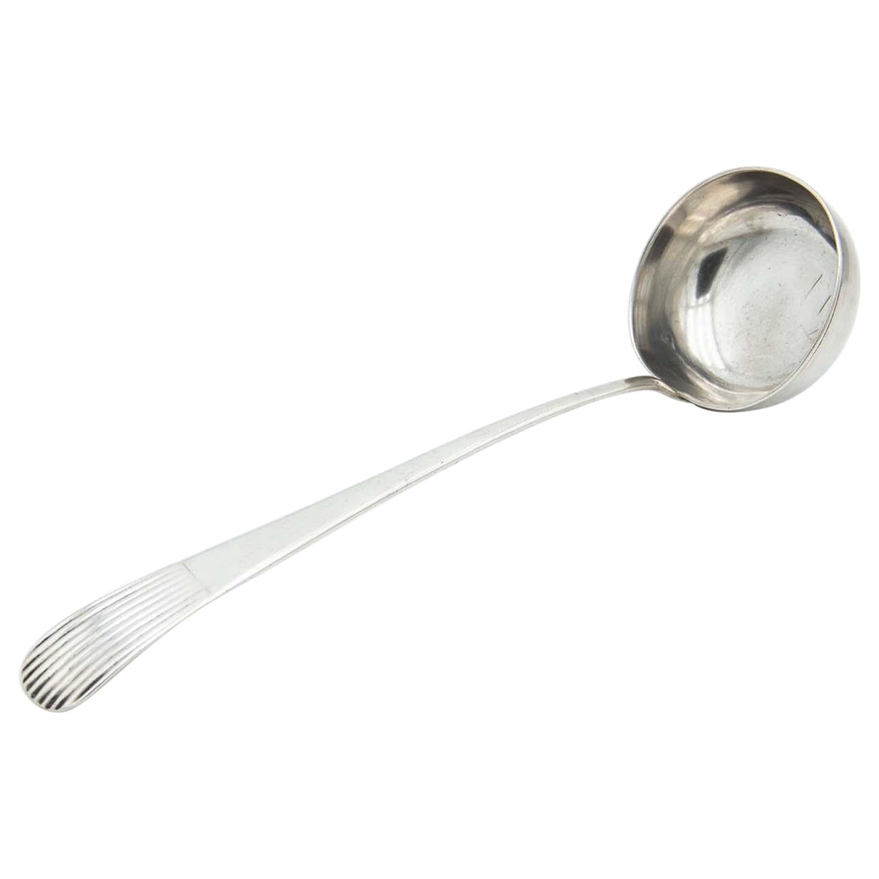 Silver soup ladle with Caninhas-style grooves on the handle