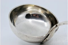 Silver soup ladle with crimped handle and ready to ship
