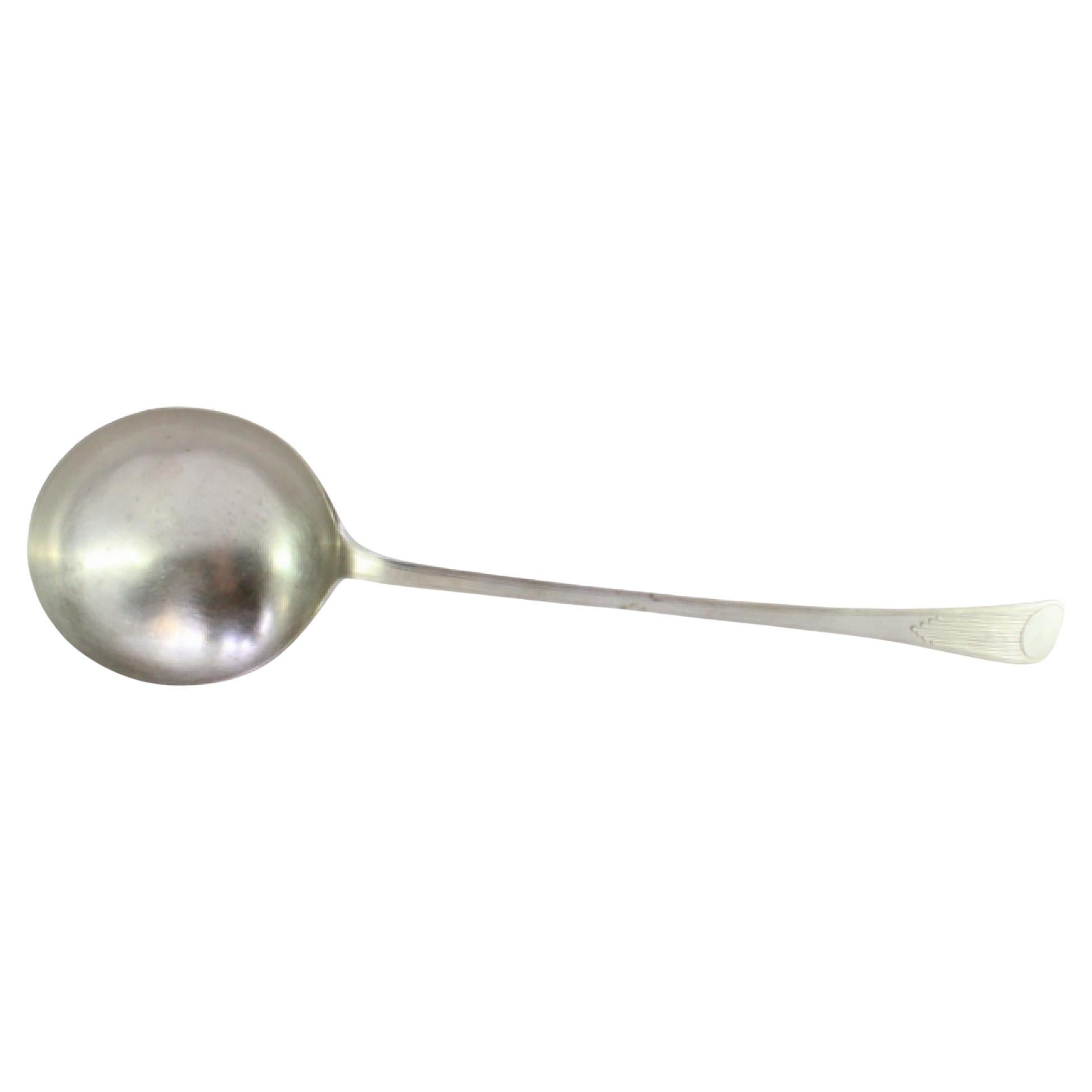 Silver soup ladle with embossed handle in the reed style and monogrammed card For Sale