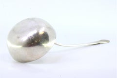 Silver soup ladle with embossed handle in the reed style