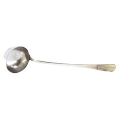 Silver soup ladle with embossed handle in the reed style