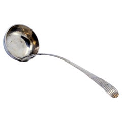 Silver soup ladle with embossed handle in the reed style