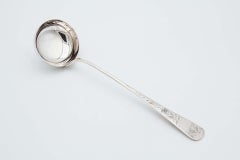 Silver soup ladle with engraved floral motifs