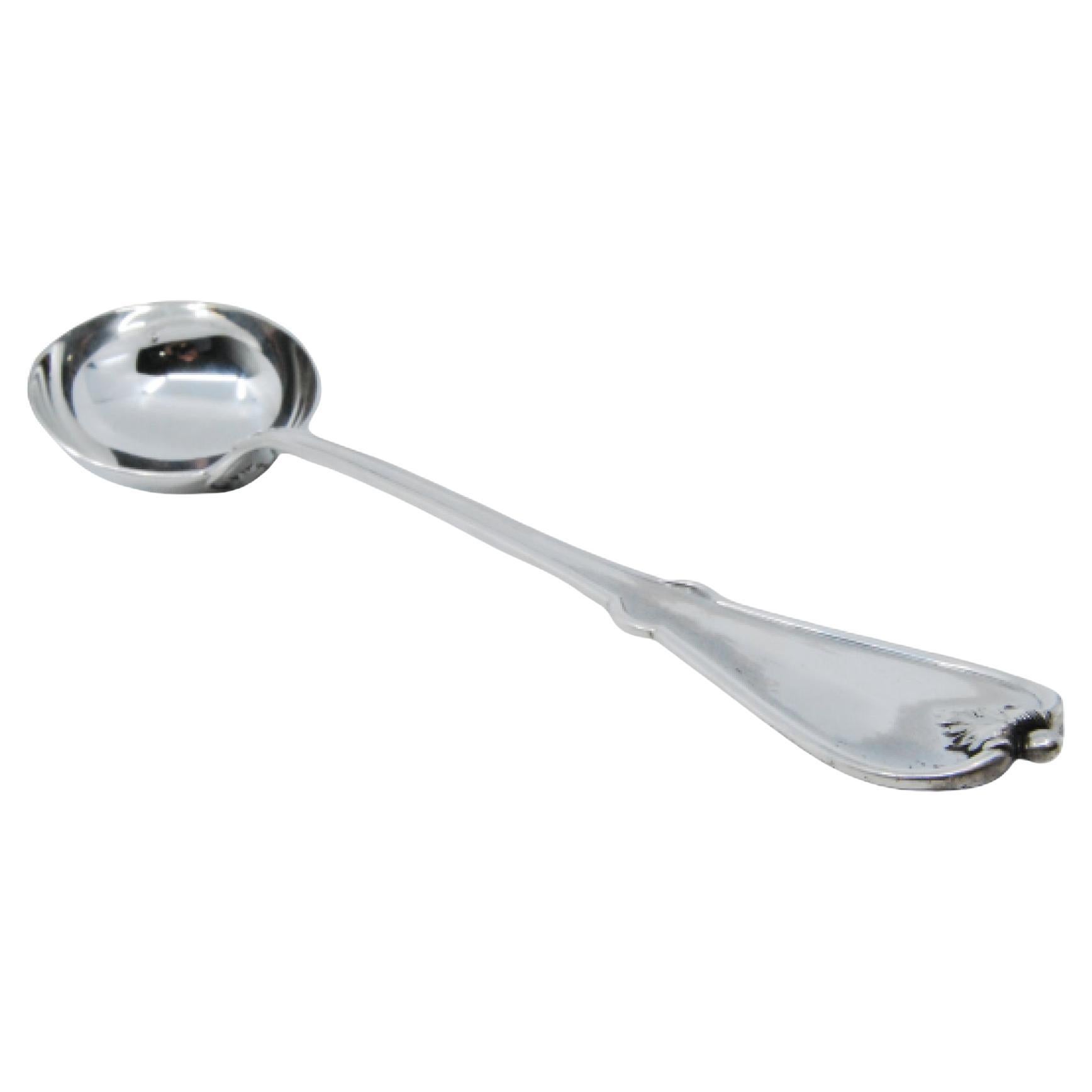 Silver soup ladle with friezes along the handle in relief with palmette