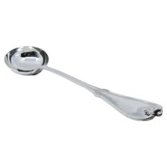 Silver soup ladle with friezes along the handle in relief with palmette