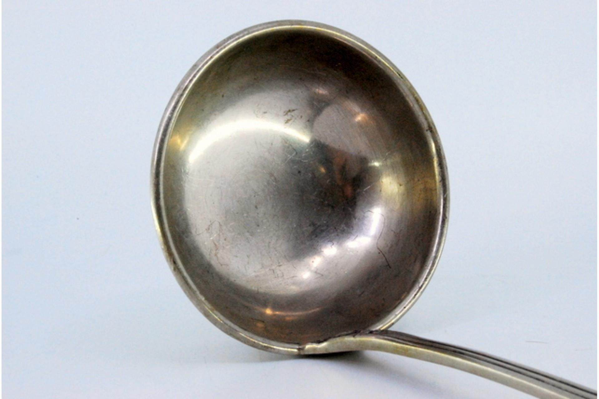 European Silver soup ladle with friezes and reliefs on the handle For Sale