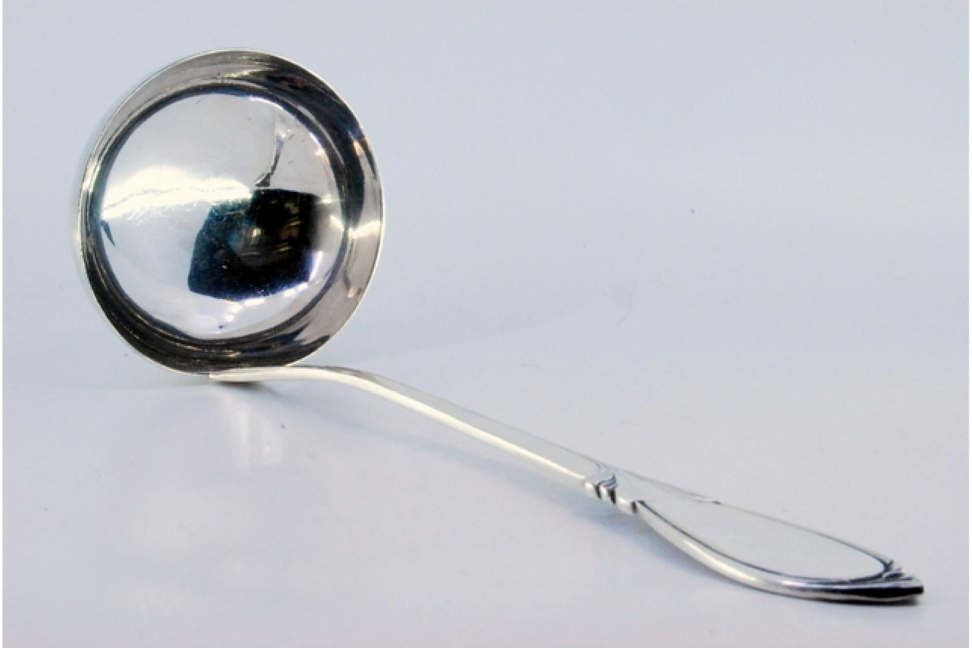 Description: Silver soup ladle with grooves along the handle and monogram plaque. Metal: Silver. Origin: Nederland. Mark: Minerva's head with helmet. Weight: 198.13 grams. Dimensions: 29x9.4cm. Content: 833/1000. Assay Office Mark: Yes. Additional