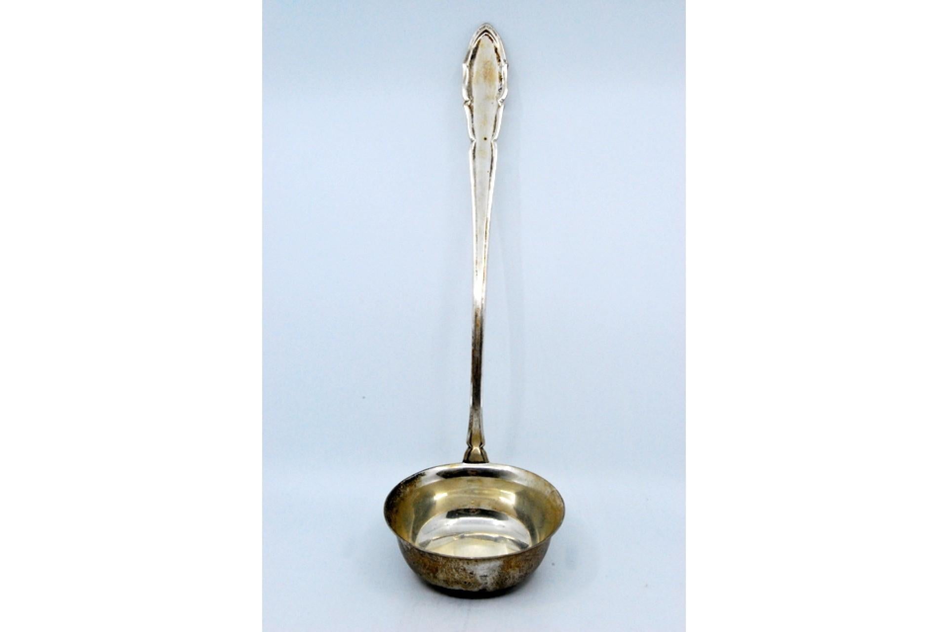 Description: Silver soup ladle with grooves along the handle. Metal: Silver. Origin: Belgian. Mark: Unreadable. Weight: 218.18 grams. Dimensions: 34x9.8cm. Content: 800/1000. Assay Mark: Yes. Additional information: Good condition.