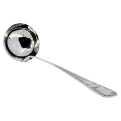 Silver soup ladle with guilloche engraving on the handle with an acanthus flower