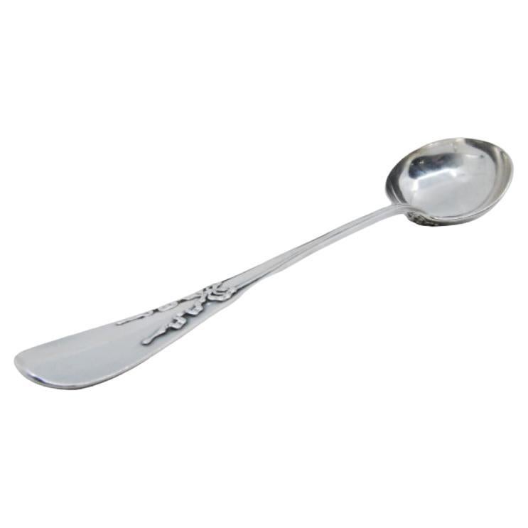 Silver soup ladle with raised loops along the handle For Sale