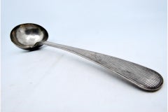 Silver soup ladle with reed-grooved handle and engraved bowl exterior