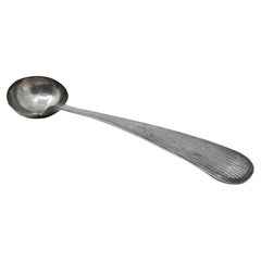 Silver soup ladle with reed-grooved handle and engraved bowl exterior Silver soup ladle with reed-grooved handle and engraved bowl exterior
