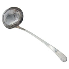 Silver soup ladle with reed-style handle
